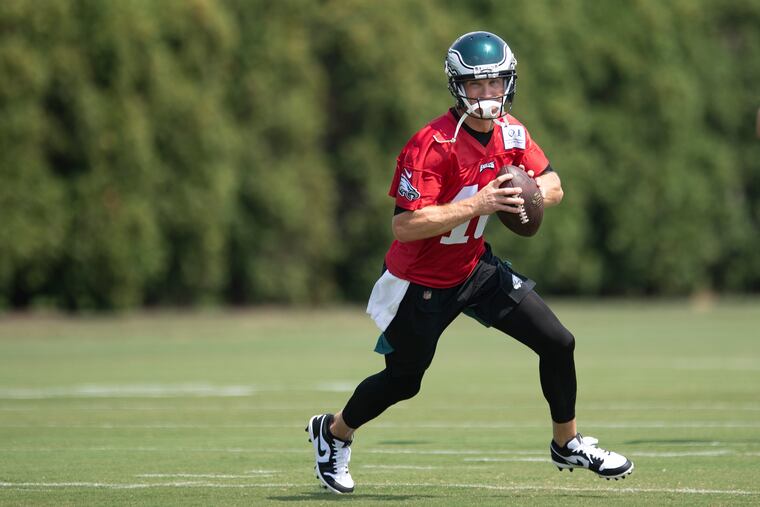 Josh McCown practices during Eagles training camp at the NovaCare Complex on Sunday.
