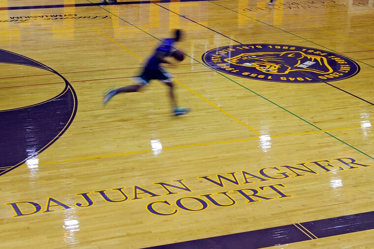 The Dajuan Wagner Court , honoring a favorite son, is unveiled at Camden High Monday, December 1, 2014.