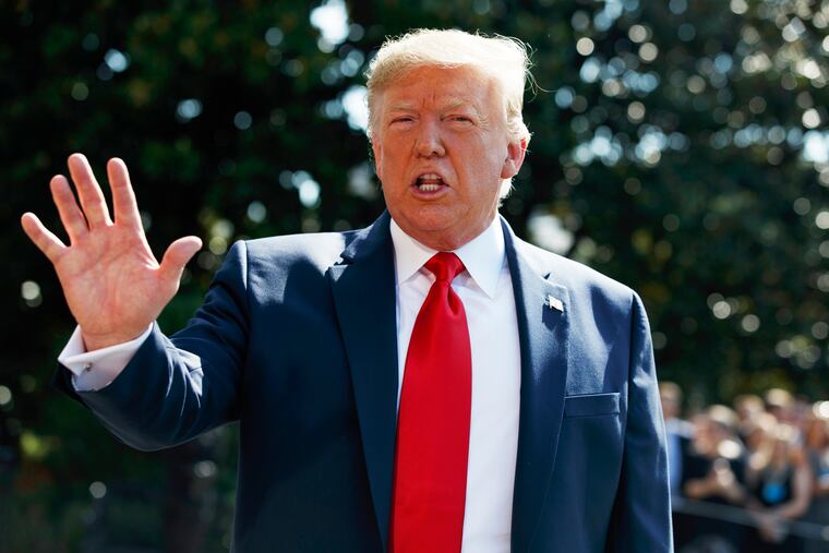 President Donald Trump talks to reporters on the South Lawn of the White House, Friday, Aug. 9, 2019, in Washington, as he prepares to leave Washington for his annual August holiday at his New Jersey golf club.
