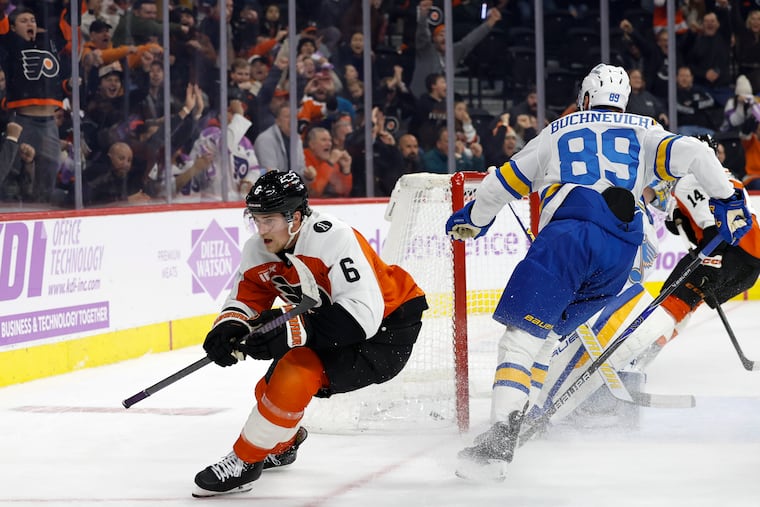 Flyers defenseman Travis Sanheim celebrates after scoring the game-winning overtime goal against the Blues.