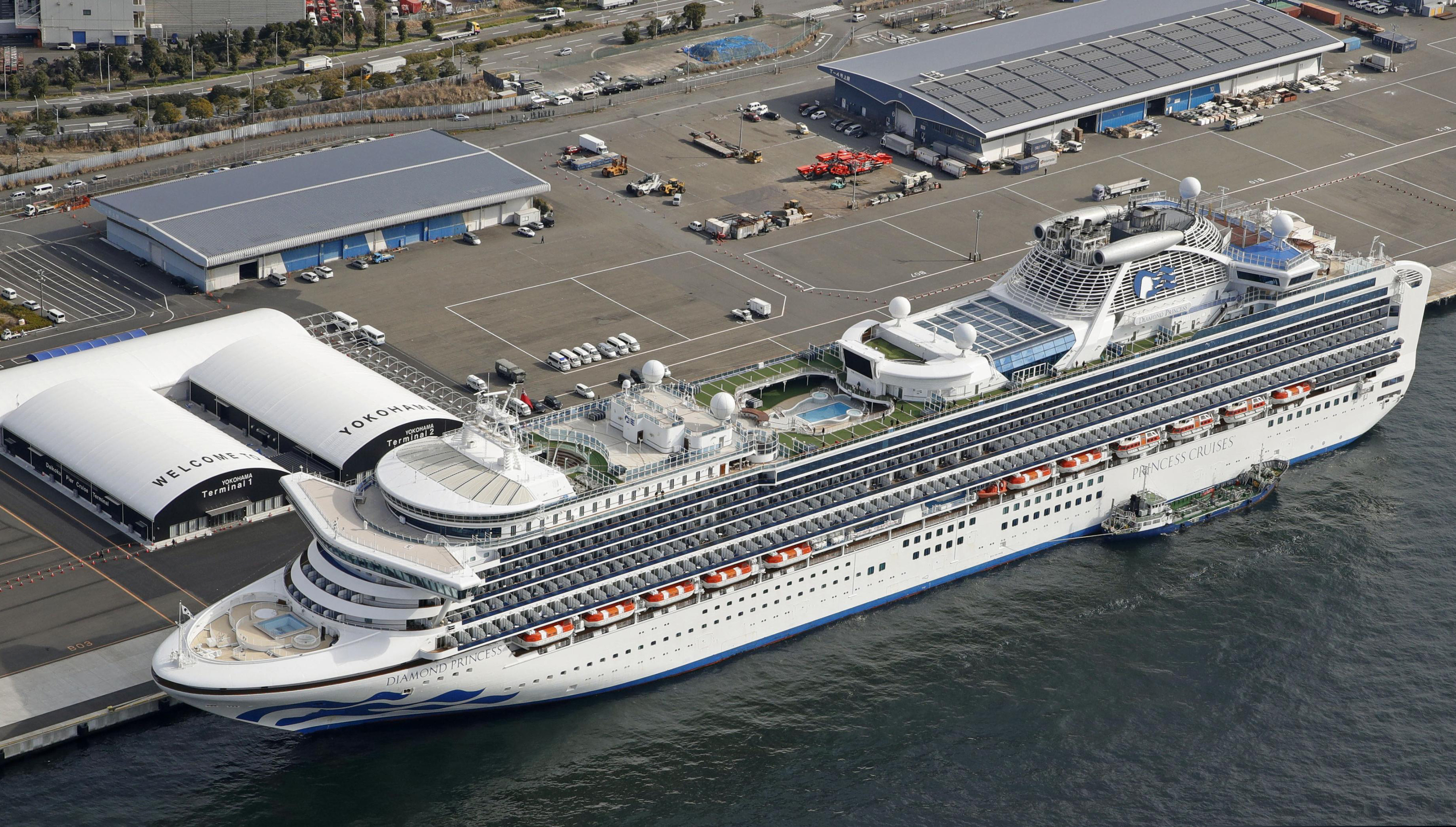 The cruise ship Diamond Princess is docked at Yokohama Port, near Tokyo, Friday, Feb. 7, 2020. Japan on Friday reported 41 new cases of a virus on the cruise ship that's been quarantined. About 3,700 people have been confined aboard the ship.
