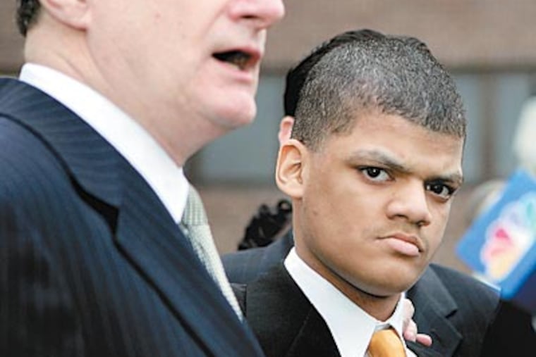 Bruce Jackson in 2006, at age 21, with his lawyer Michael Critchley. (JOSE F. MORENO / Associated Press)