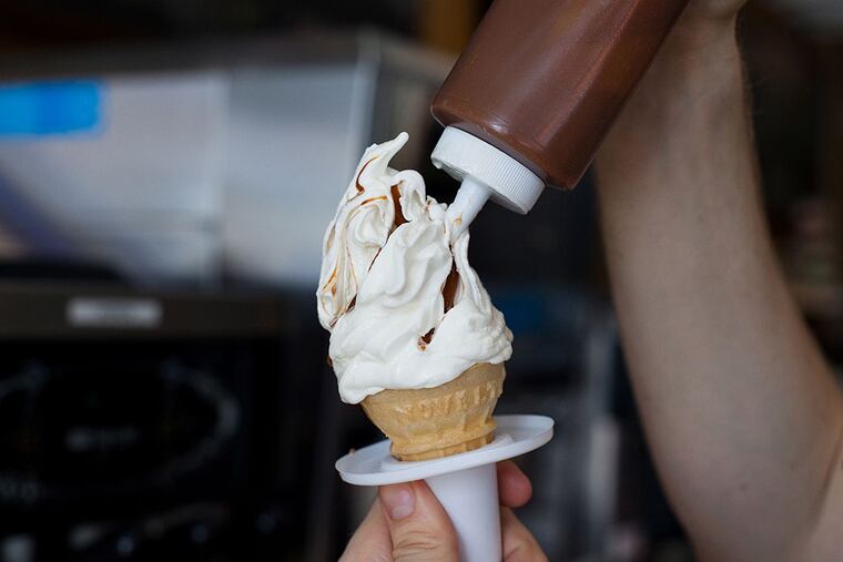 "Salty Pimp" specialty ice cream cone, vanilla soft serve injected with dulce de leche, dipped in chocolate shell and topped with sea salt from Big Gay Ice Cream on South Street east of Broad. (Donny Tsang photo)