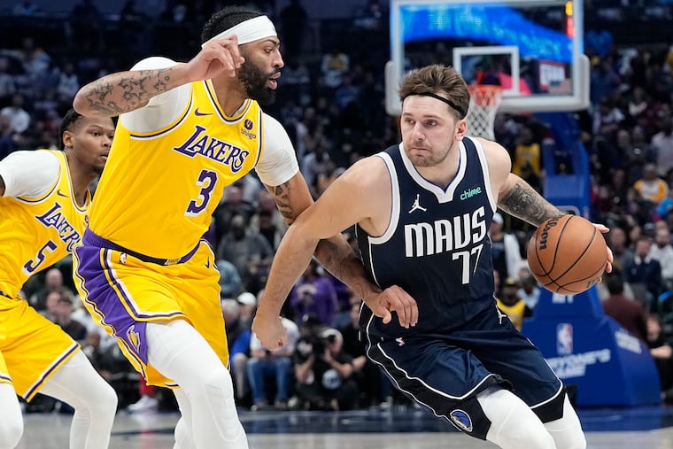 The Dallas Mavericks traded Luka Doncic to the Los Angeles Lakers in a deal centered on Anthony Davis (3), shocking the NBA world.