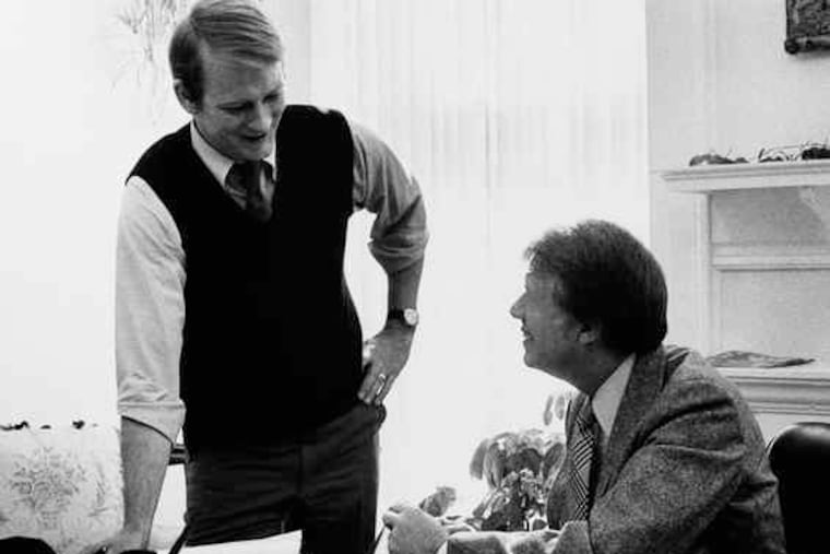President Jimmy Carter , at his desk in his private study at the White House, meeting with Jody Powell on Feb. 10, 1977. Carter called Mr. Powell's death "a great personal loss."