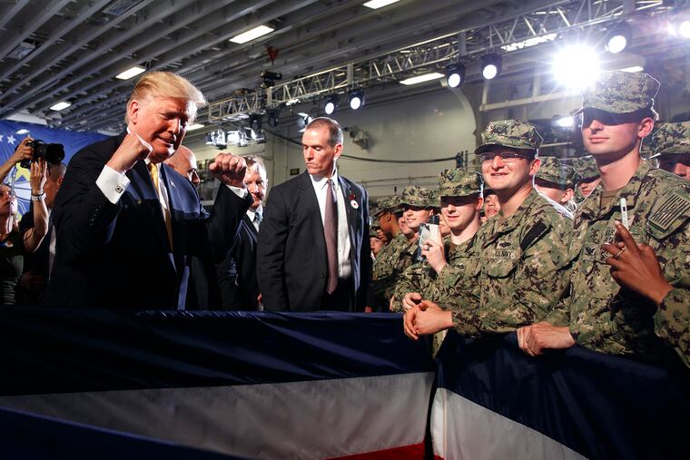 President Donald Trump greets troops after speaking at a Memorial Day event aboard the USS Wasp, Tuesday, May 28, 2019, in Yokosuka, Japan.