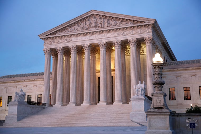 The U.S. Supreme Court building at dusk on Capitol Hill in Washington.