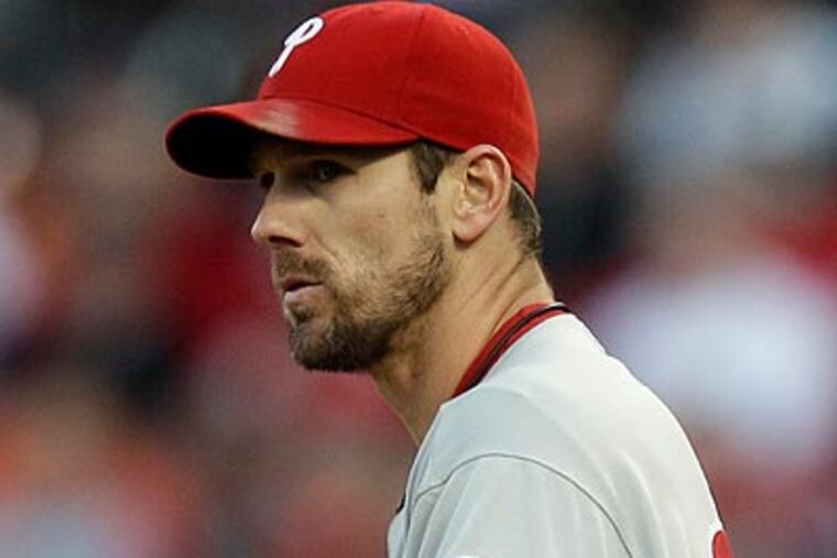 Cliff Lee gave up a career high six walks in the Phillies' 3-1 loss to the Cardinals in St. Louis. (Jeff Roberson/AP)