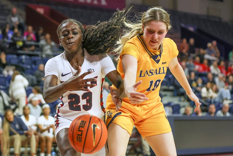 La Salle’s Nicole Melious (right) scored 15 points in the Explorers' loss to Rhode Island.