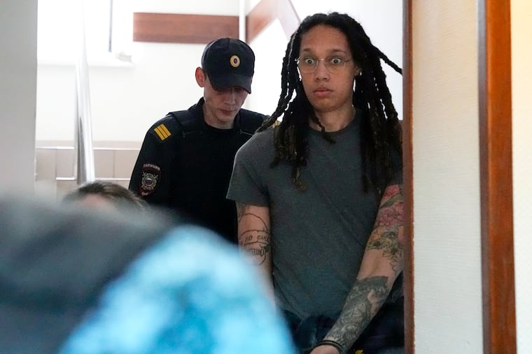 Brittney Griner is escorted to a courtroom for a hearing in Khimki, just outside Moscow, on Monday.