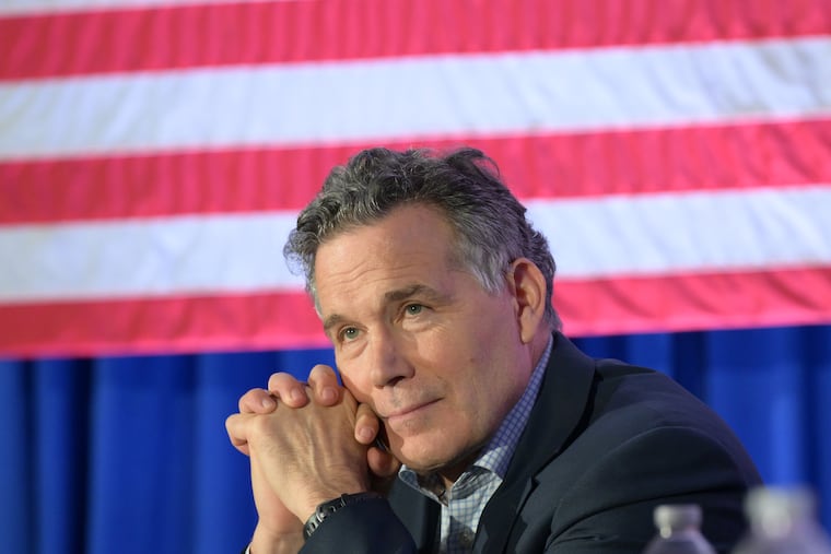 Republican Senate Candidate Dave McCormick listens to supporters during an August 2024 event in Langhorne.