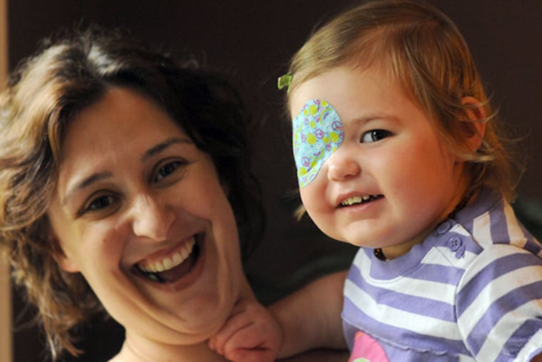 Meghan Wilson and daughter Vivian Wilson, 2, who has epilepsy, at their Scotch Plains, NJ home on June 18, 2013. ( APRIL SAUL / Staff )