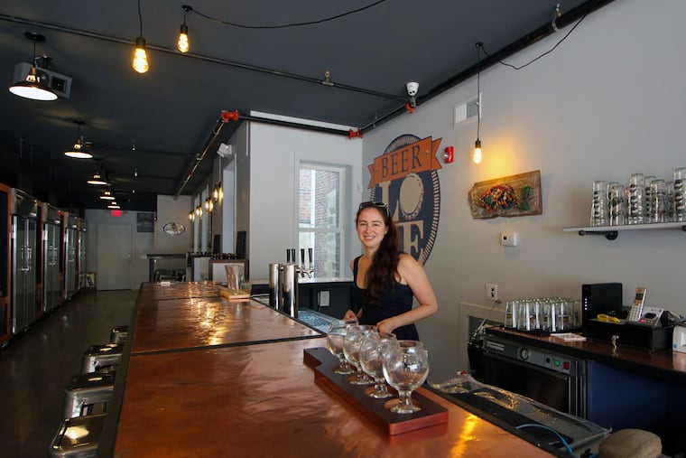 Kristen Cevoli at the bar of BeerLOVE, 714 S. Fourth St.
