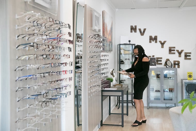 Tiffany Easley opens up her store in West Philadelphia in this 2020 file photo. Easley is one of the business owners who spoke with Gene Marks about getting support from the Merchants Fund.