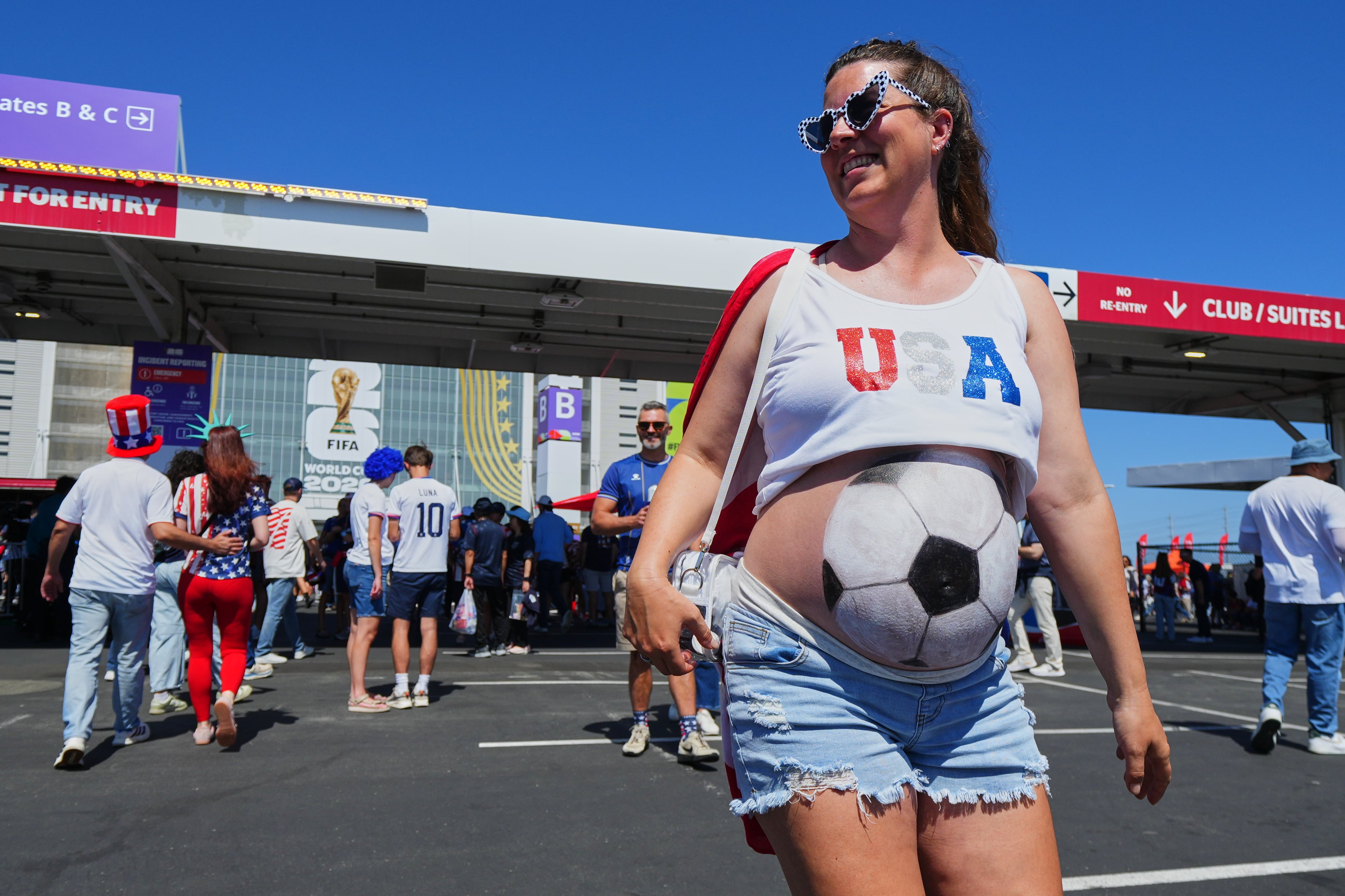 World Cup fans flood stadiums and fan zones with dazzling costumes, facepaint and flags — in photos