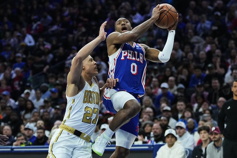 Tyrese Maxey (right) scored 21 points against Boston on Tuesday.