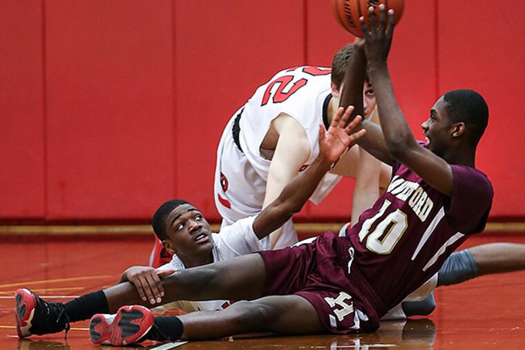 The Haverford School's Levan Alston (front) picked Temple over Penn State and Virginia Commonwealth. (Steven M. Falk/Staff file photo)