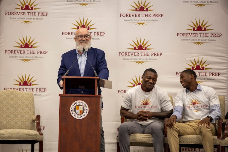 Nick Howley, a 1970 St. Joseph's Prep alumnus, announces his gift of $74 million dollars to the school at its Kelly Fieldhouse in Philadelphia on Friday.