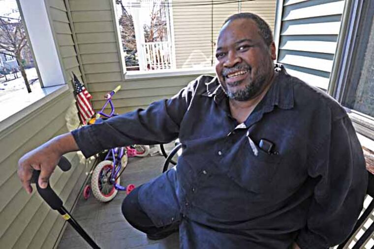 Two men who were exonerated and cleared of all charges after being imprisoned: David Shepard of Newark, NJ; and VIncent Moto of Philadelphia, photographed on Feb. 14, 2013. Here, David Shepard at his Newark, NJ home. ( APRIL SAUL / Staff Photographer )