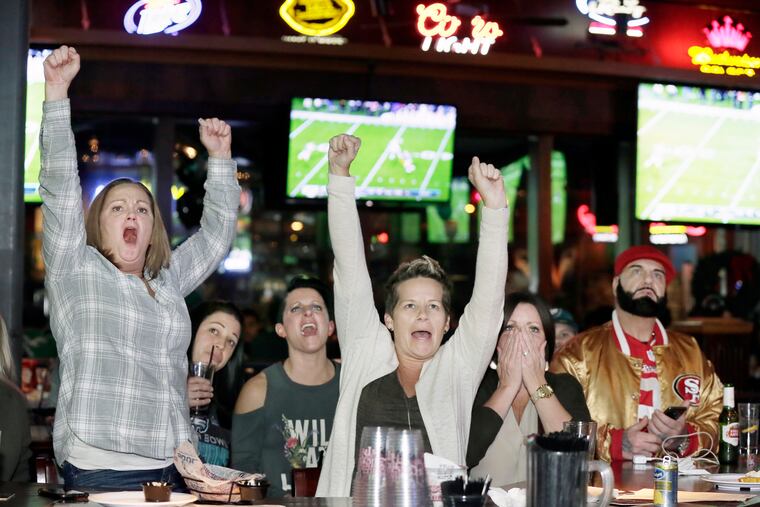 At Chickie and Pete's in South Philadelphia, Eagles fans cheer on the team during a 2018 game against the Los Angeles Rams.