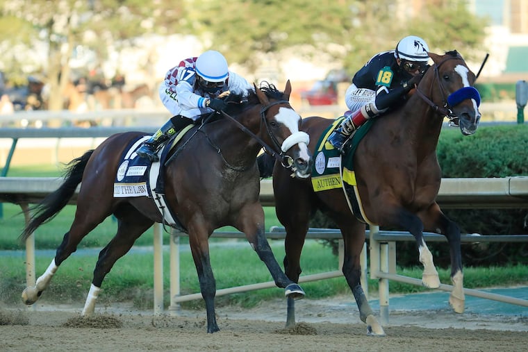 Authentic, right, with jockey John Velazquez up, leads Tiz the Law, with Manny Franco up, down the stretch on the way to winning the 146th running of the Kentucky Derby.
