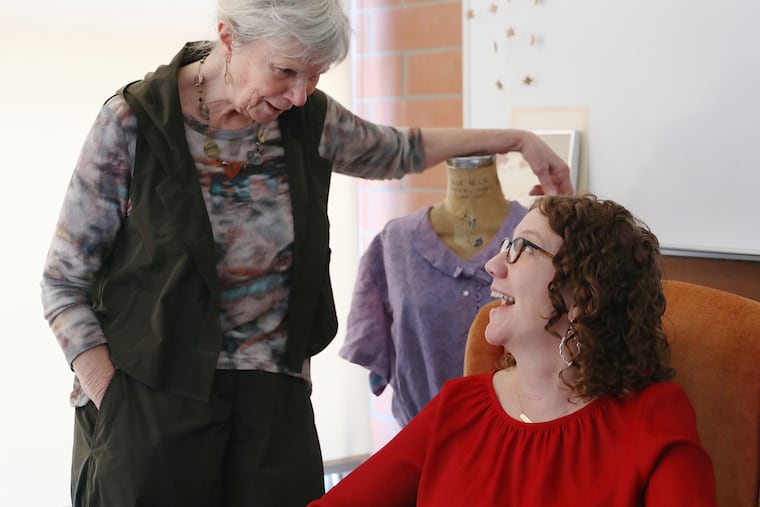 Ruth Ost (left), senior director of Temple University's Honors Program, with Inquirer staff writer Kristen Graham in her office on the Temple campus in North Philadelphia.