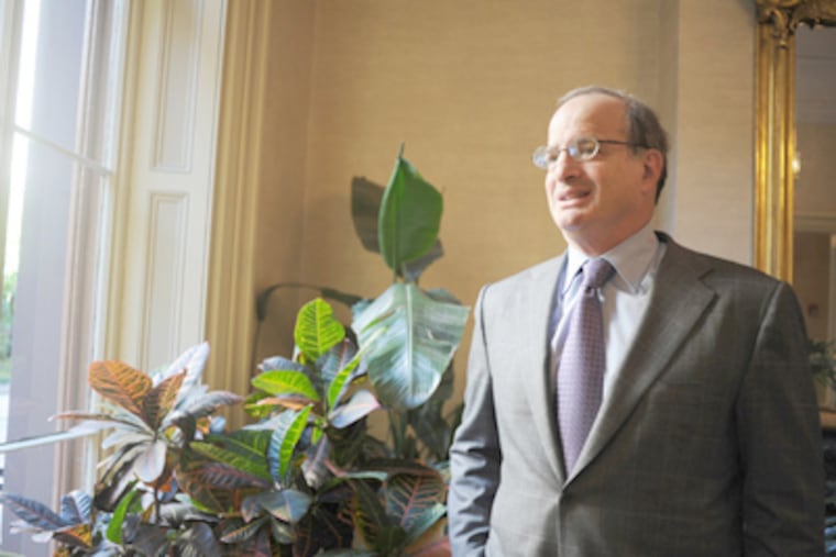 Daniel Berger in his Locust Street office. (Sarah J. Glover / Staff Photographer)