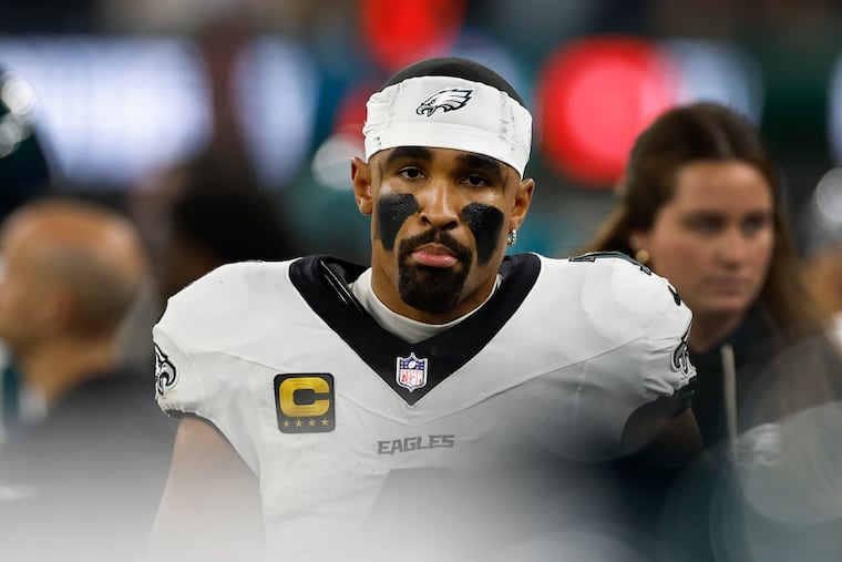 Eagles quarterback Jalen Hurts on the sidelines against the Los Angeles Chargers on Monday, December 8, 2025 at SoFi Stadium in Inglewood, Calif.