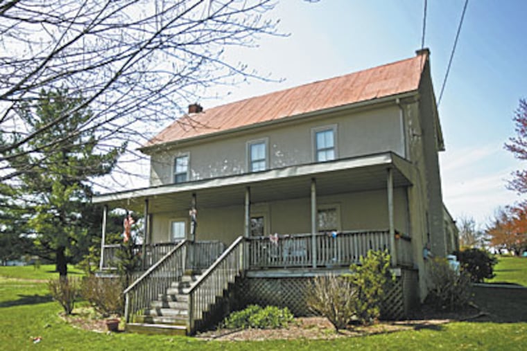 This house in Honey Brook has been in Melissa Miller’s family for more than a century. On Thursday, it is scheduled to go to sheriff’s sale. (MICHAEL BRYANT / Staff Photographer)