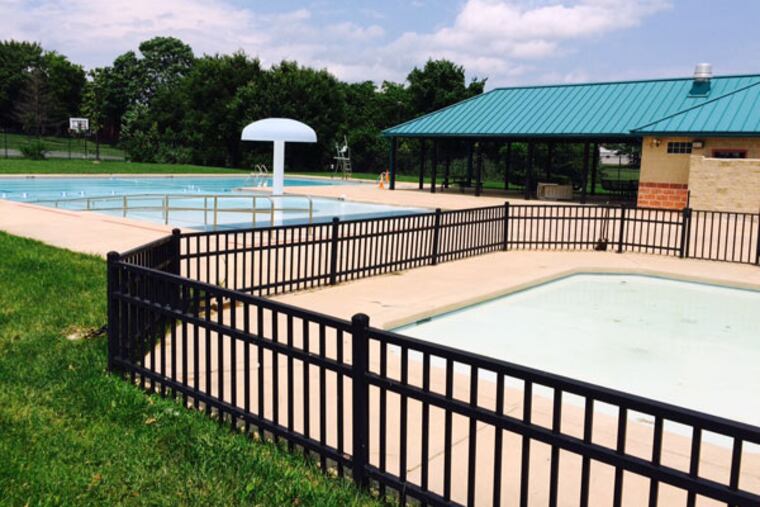 Chester’s sole swimming pool, in Memorial Park is expected to open Saturday, about two weeks behind schedule. Officials will extend the season for a week past Labor Day. (MARI A. SCHAEFER / Inquirer Staff)