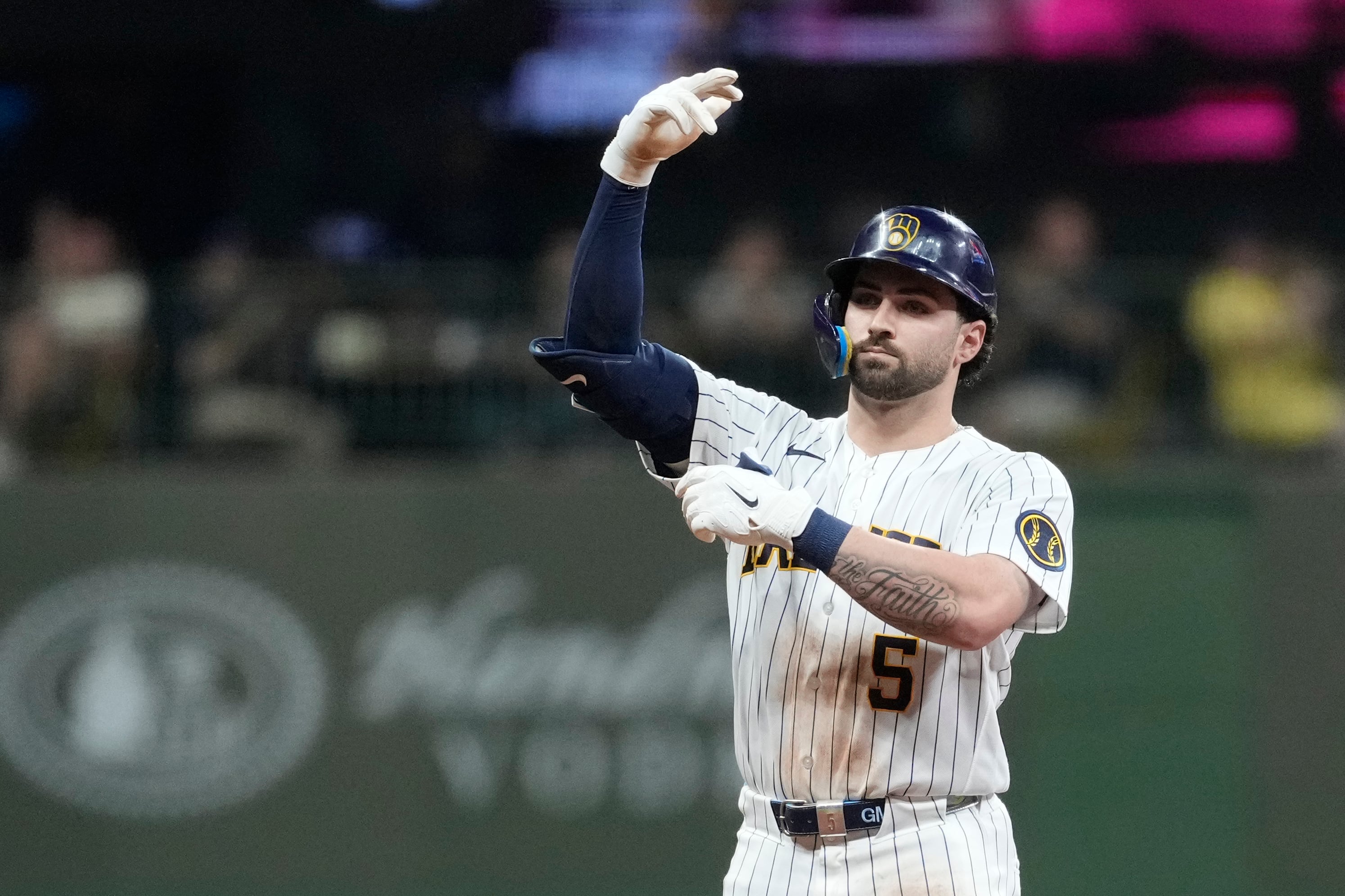 Brewers pour it on early as Garrett Mitchell leads the way in 13-9 victory over the Reds