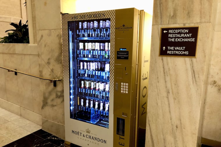 The Moet Mini-matic champagne vending machine is set up in the lobby of the Ritz-Carlton Hotel.