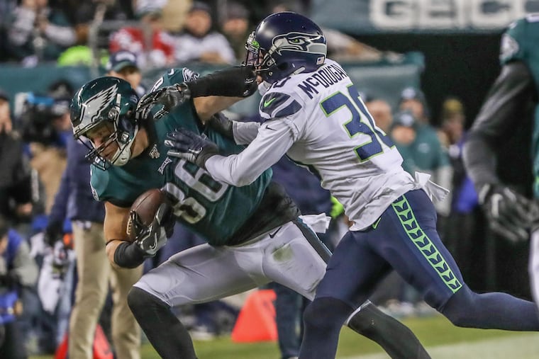 Zach Ertz's stretched from the grasp of Seattle free safety Bradley McDougald to gain a first down in the fourth quarter during the Eagles' wild-card playoff loss to the Seahawks in January.