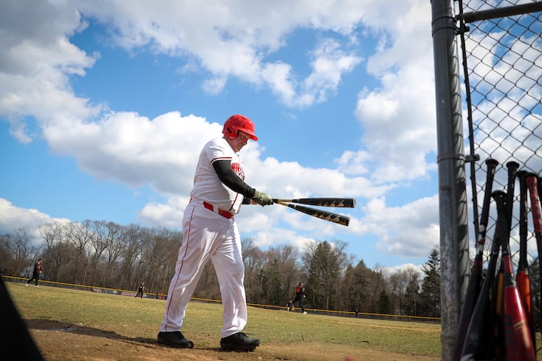 Jim Fullan, 56, who is a member of the Montgomery County Community College baseball team, takes a practice swing during their game in Blue Bell, Pa. on March 5, 2023.