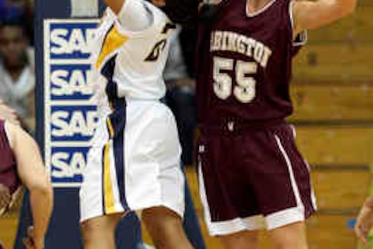 Abington's Emily Leer fouls Cheltenham's Kira Ogden in the first quarter of the game, played at Villanova University.