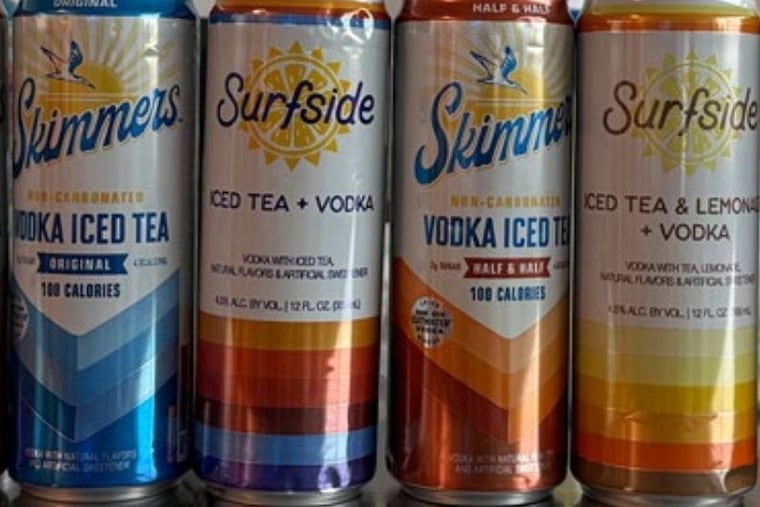 Image included in complaint of cans of Skimmers — a canned cocktail from Anheuser-Busch — lined up alongside cans of Stateside, a vodka iced tea and lemonade line from Philadelphia-based Stateside Brands.