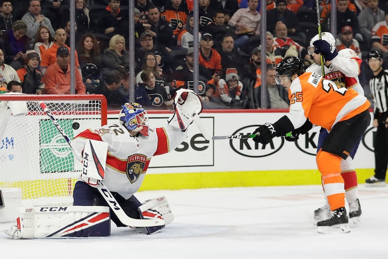 Flyers forward James van Riemsdyk watches teammate Ivan Provorov's first-period goal sail past Florida Panthers goaltender Sergei Bobrovsky.
