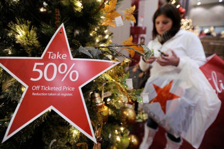 It's 1 a.m. at Macy's in Schaumburg, Ill., where Adriane Schauf prowls for not-so-elusive deals. Along with the moribund economy, retailers face fewer holiday shopping days this year.