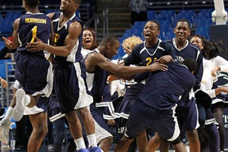 Math, Civics & Sciences Charter celebrates after defeating Lincoln Park Charter. (Keith Srakocic/AP Photo)