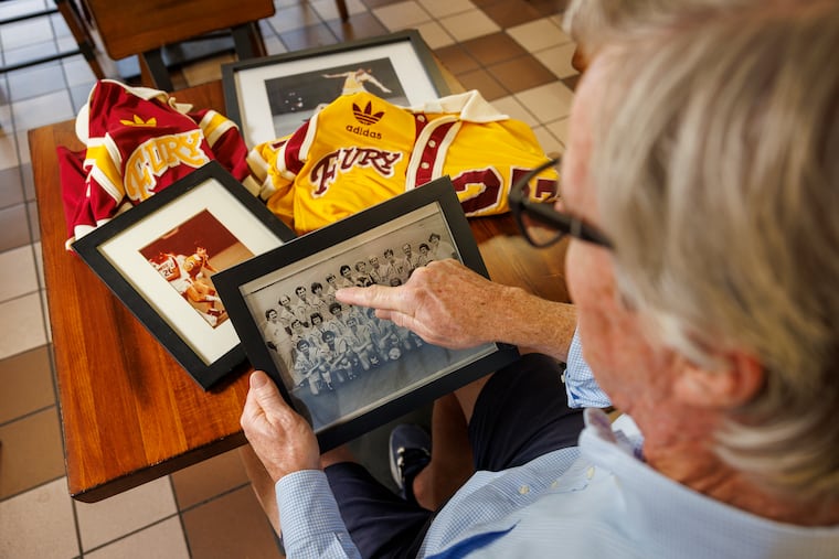 Kevin Murphy, owner of Varsity Pizza and Subs in Lawrenceville, N.J., points at himself as a player for the former Philadelphia Fury soccer team.