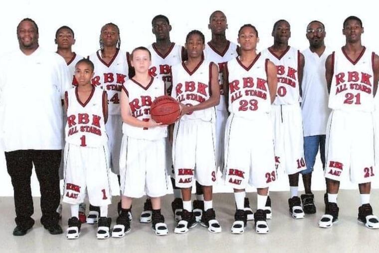 Team photo of Paul Gripper's youth team, the RBK All Stars. Son Joey, 3, is in middle holding ball. Michael Kidd-Gilchrist is the fourth player from the left in the back row.