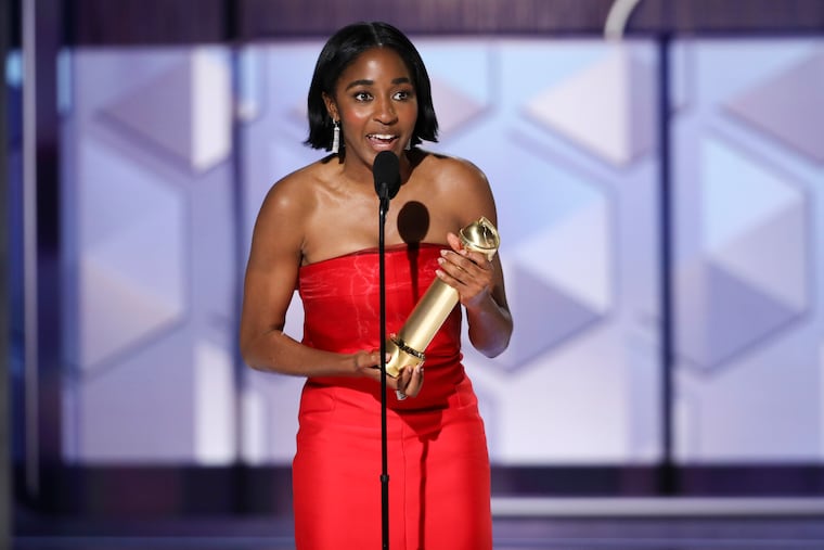 This image released by CBS shows Ayo Edebiri accepting the award for best performance by a female actor in a TV series for her role in "The Bear" during the Golden Globe Awards on Sunday, Jan. 7.