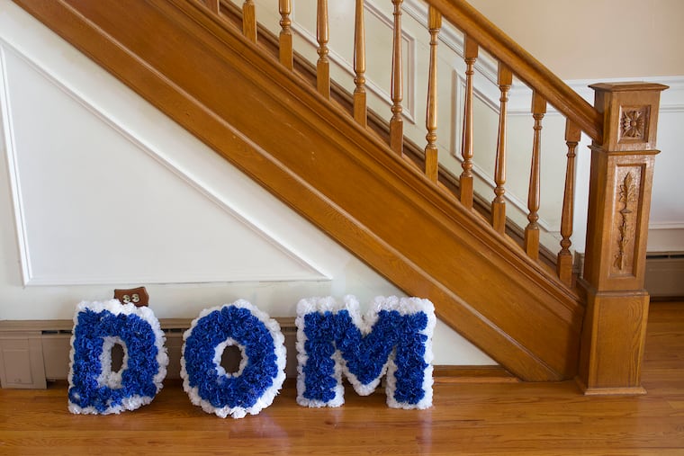 Nakisha's Billa’s 21-year-old son, Domonic, was killed March 29, 2021. These floral letters, which were
photographed in her living room, were part of an arrangement at his funeral service.