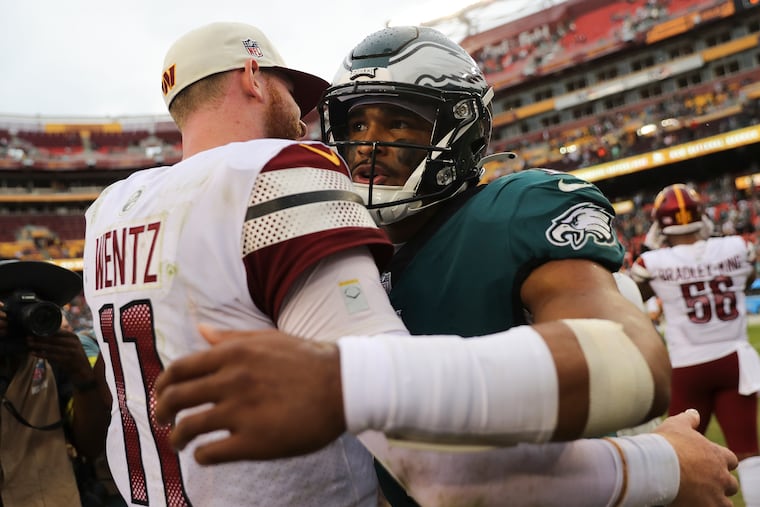 Eagles quarterback Jalen Hurts and Washington Commanders quarterback Carson Wentz once were teammates but took different approaches to their role.