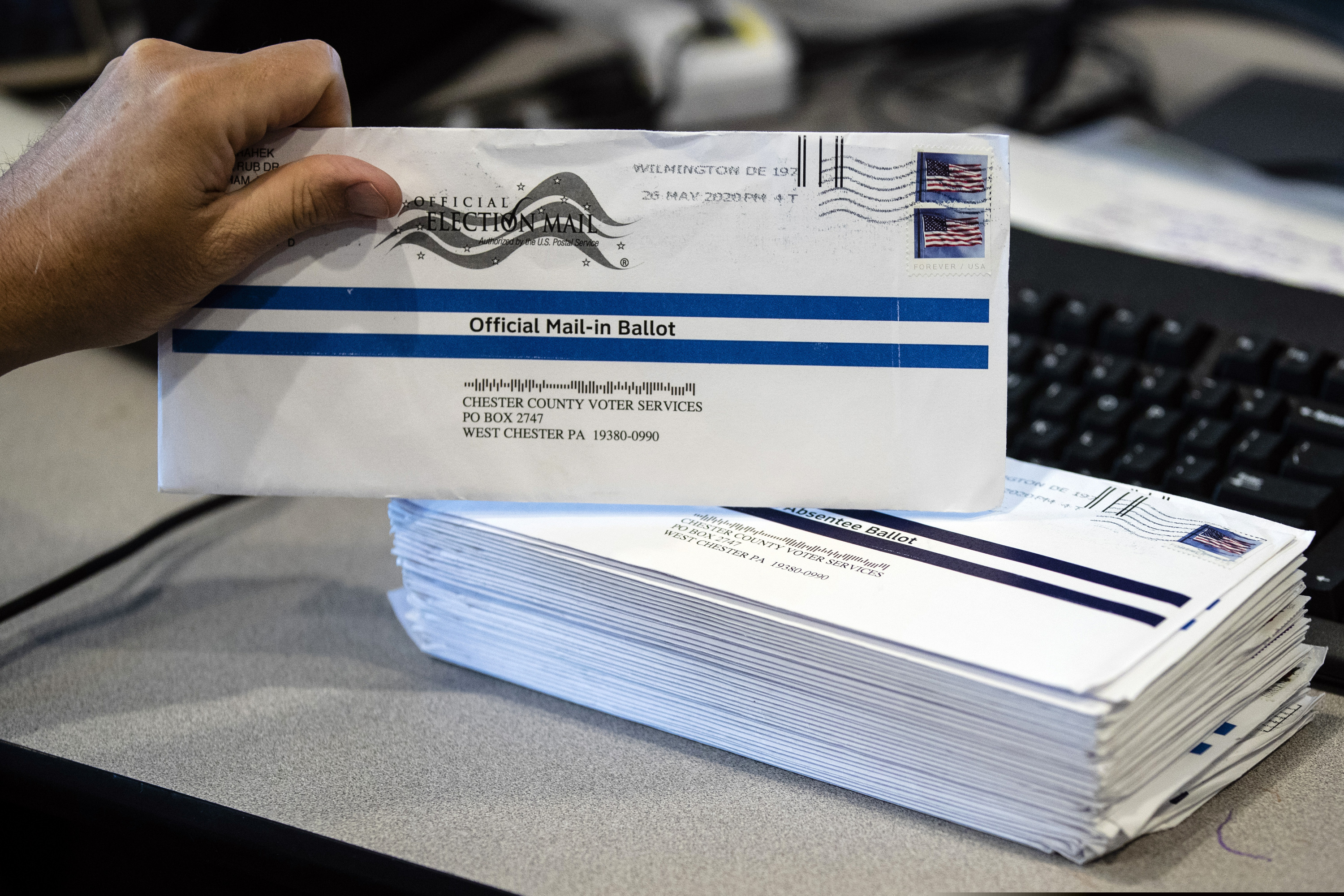 Mail-in ballots for the June 2 Pennsylvania primary election being processed at the Chester County Voter Services office in West Chester, Pa.