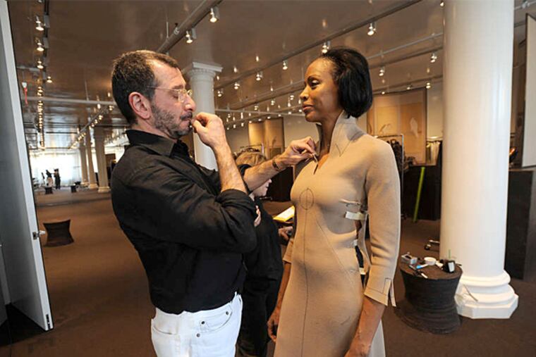 Ralph Rucci fitting model Coco Mitchell in 2008. He was among the first designers to use an African American as a fit model. (Jennifer S. Altman)