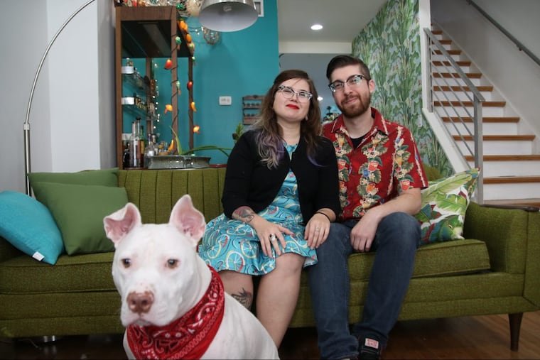 Stephanie Aviles and her boyfriend Riki Noar have found “home” in Fishtown with their pit bull, Piggy.