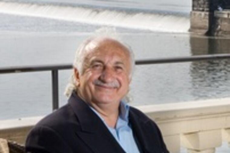 Jovial Andre Darwish , former maitre d' at Le Bec-Fin, left retirement to welcome Water Works diners.