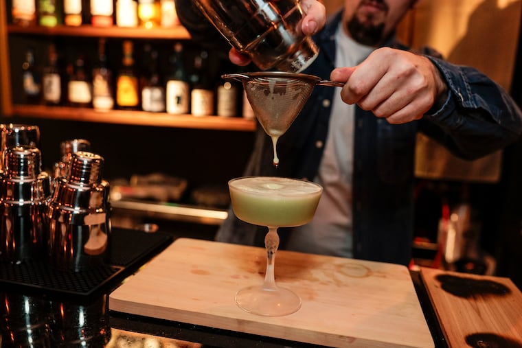 Bar manager Rob Scott making a Sadōtini at the Bar Almanac at Ogawa, 310 Market Street, Wednesday, November 20, 2024.