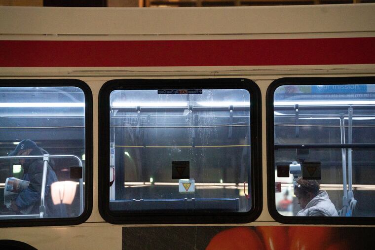 Two riders on a SEPTA bus near City Hall
.
